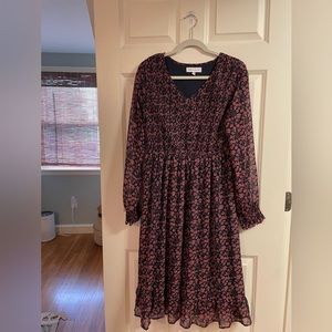 Adorable long sleeve floral midi dress.